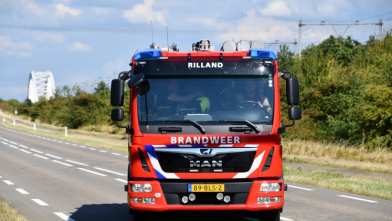 Berm in brand langs het spoor bij Rilland