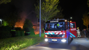 Felle brand naast woning in Middelburg